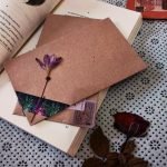 Photo by Ayesha Lucky on <a href="https://www.pexels.com/photo/brown-envelopes-with-flowers-and-stickers-inside-open-book-20664651/" rel="nofollow">Pexels.com</a>